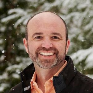 Joe Pulizzi, content marketing expert and founder, smiling outdoors in winter setting
