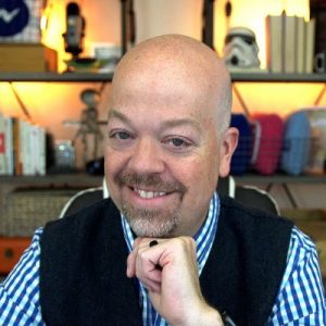 Mike Allton, digital marketing professional, smiling at camera in office