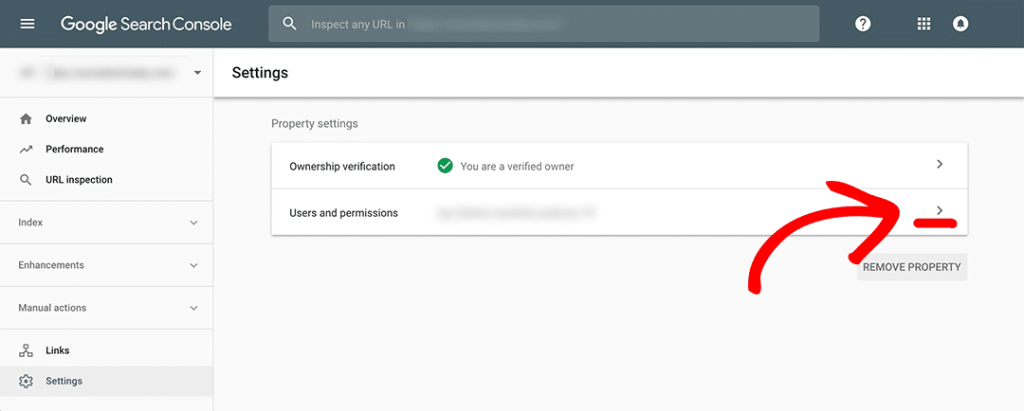 Google Search Console Settings page showing verified owner status with arrow pointing to Remove Property button