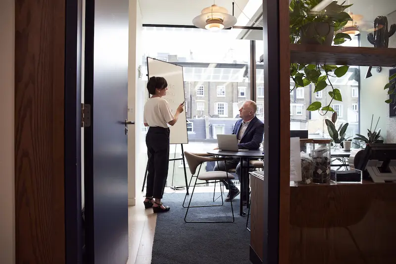 What Is An Seo Company And What Does It Do? 10 People meeting in an office boardroom