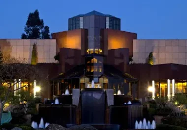 Blackhawk Museum exterior at dusk with illuminated architectural features