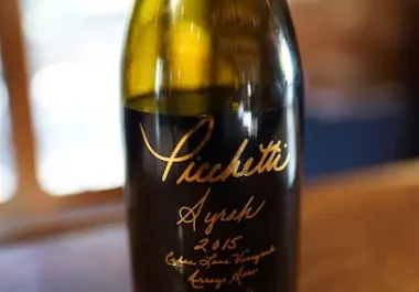 Picchetti Winery wine bottle on wooden table
