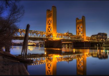 Tower Bridge at night illuminated in downtown Sacramento